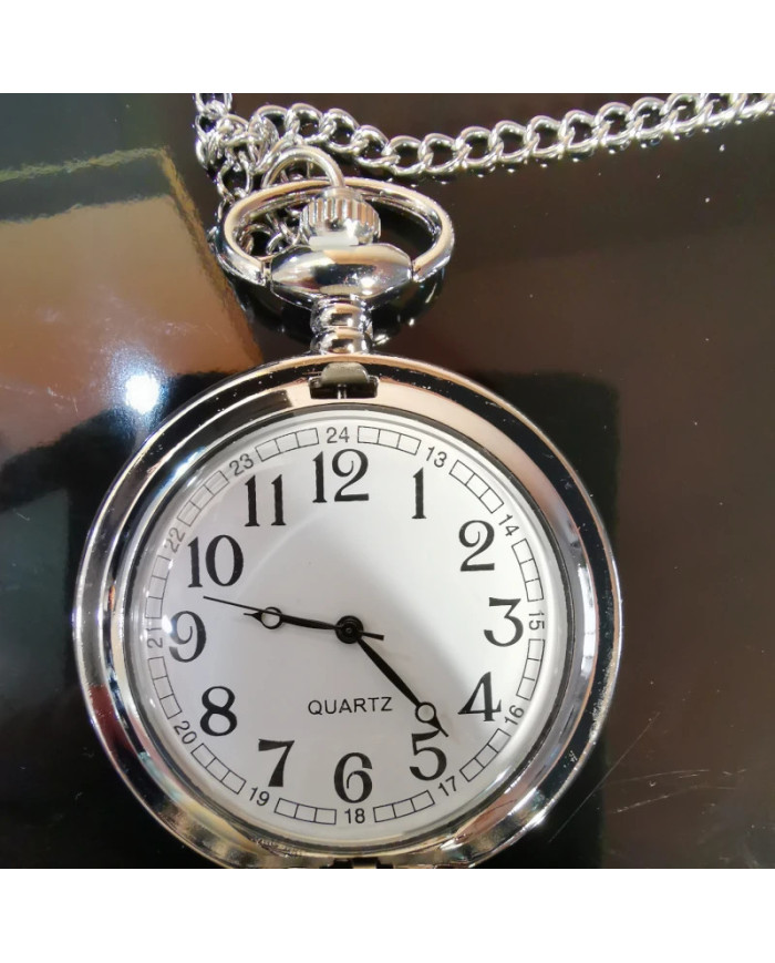 Pocket watch oon a chain relief moon sunshine