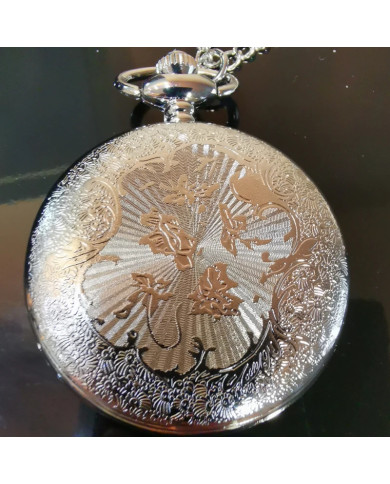 Pocket watch oon a chain relief moon sunshine